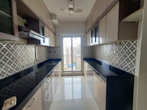 Kitchen in 2 BHK Apartment at Shree Tirupati STG Signature Residency, Patlipada – for Rent