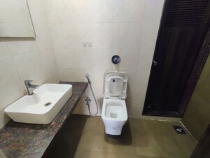 Bathroom in 2 BHK Apartment at Shree Tirupati STG Signature Residency, Patlipada – for Rent