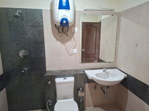 Bathroom in 3 BHK Apartment at ATS Golf Meadows Lifestyle, Central Derabassi – for Rent