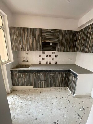Kitchen in 2 BHK Apartment at Eureka Diya Green City, Raj Nagar Extension – for Rent