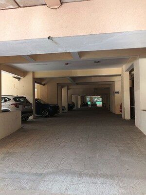 Parking in 3 BHK Apartment at Eros Woodbury Tower, Charmwood Village – for Sale