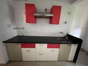 Kitchen in 1 BHK Apartment at Puranik Hometown, Ghodbunder Road – for Rent