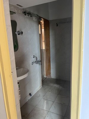 Bathroom in 1 BHK Apartment at Puranik Hometown, Ghodbunder Road – for Rent