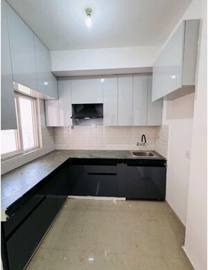 Kitchen in 2 BHK Apartment at Shree Vardhman Green Court, Sector 90 – for Rent