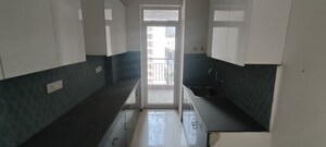 Kitchen in 3 BHK Apartment at Pareena Express Heights, Sector 99 – for Rent