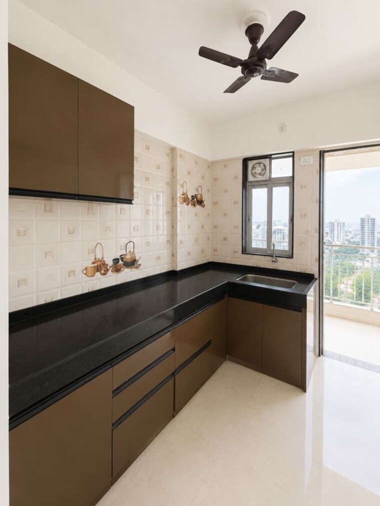 Kitchen, somani-dream-home 2.5 Bedroom 900 Sq.Ft. Apartment In Punawale Pune 10491347