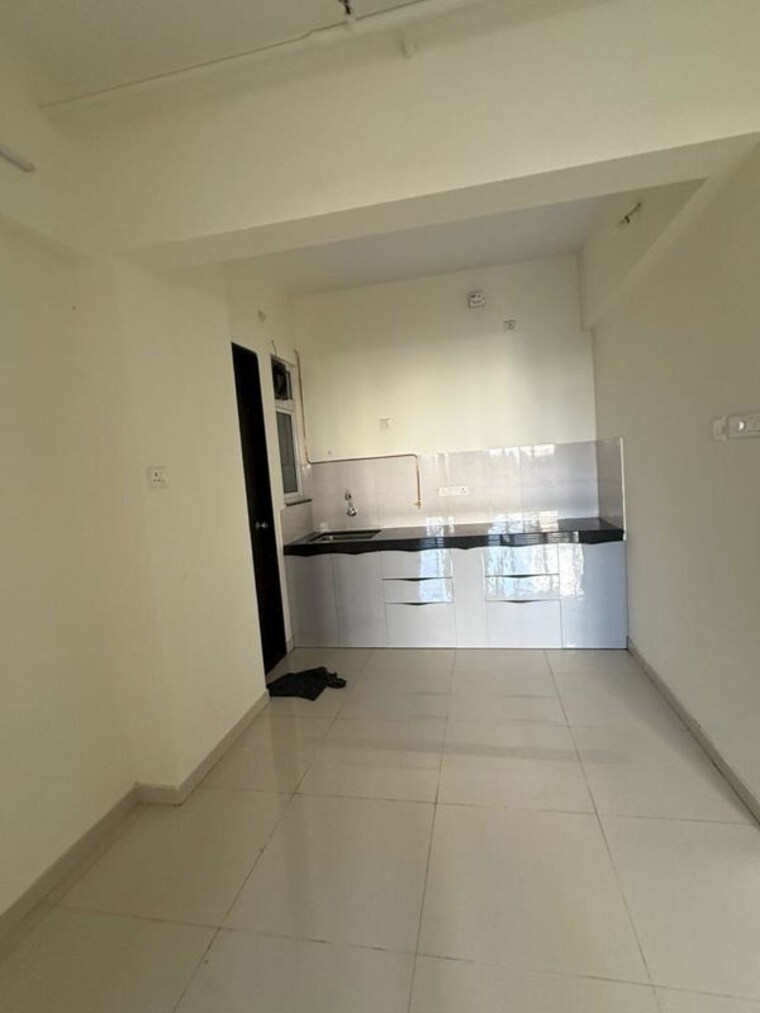 Kitchen, kolte-patil-life-republic-r-10 2 Bedroom 710 Sq.Ft. Apartment In Hinjewadi Pune 10491412