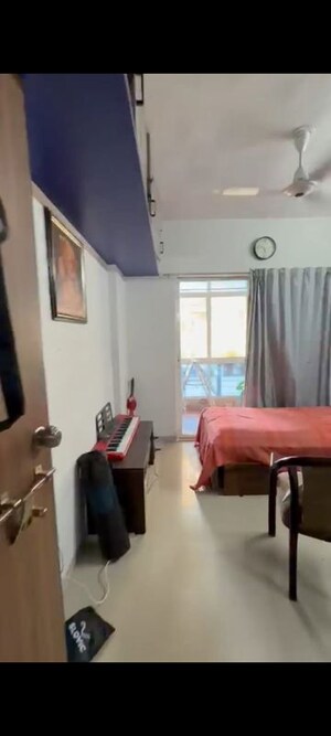Living Room in 2 BHK Apartment at Mantra Ira, Undri – for Rent