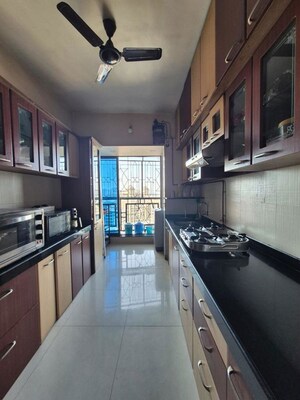 Kitchen in 3 BHK Apartment at Chaurang CHS, Sanpada – for Sale