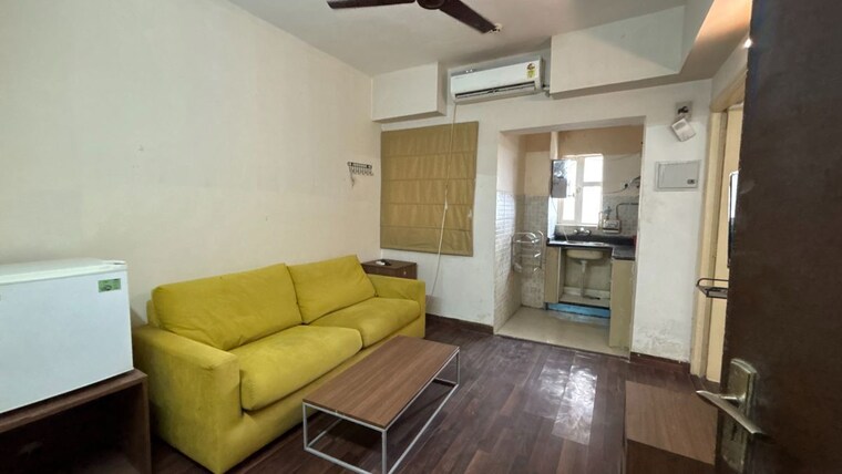 Living Room, paras-tierea 1 Bedroom 495 Sq.Ft. Apartment In Sector 137 Noida 10491538
