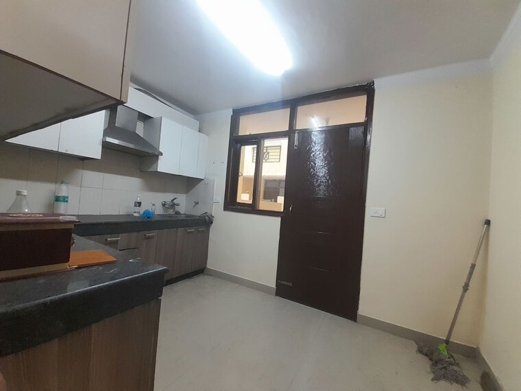 Kitchen, maya-garden-city 2 Bedroom 1307 Sq.Ft. Apartment In Lohgarh Zirakpur 10491570