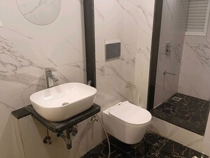 Team Area in 2 BHK Apartment at Ruparel Ariana, Parel – for Rent