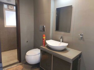 Bathroom in 3 BHK Apartment at Ruparel Ariana, Parel – for Rent