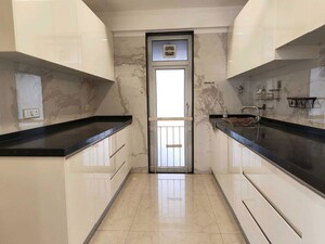 Kitchen in 3 BHK Apartment at Ruparel Ariana, Parel – for Rent
