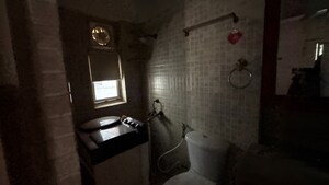 Bathroom in 2 BHK Apartment at Paras Tierea, Sector 137 – for Rent