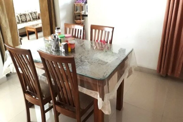 Dining area, supertech-defence-colony-phase-iv 1 Bedroom 650 Sq.Ft. Apartment In Wagholi Pune 10492041