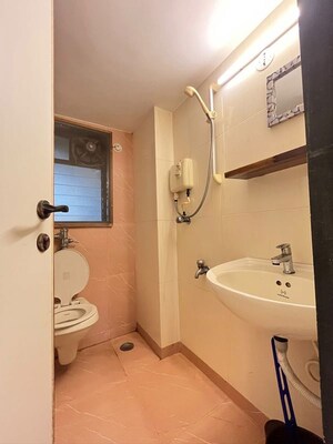 Bathroom in 3 BHK Apartment at Samartha Meghdoot Apartment, Andheri West – for Rent