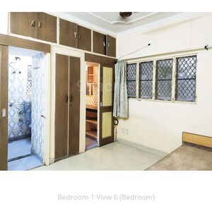Bedroom in 3 BHK Builder Floor at Panchsheel Enclave – for Rent