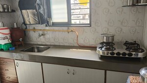 Kitchen in 2 BHK Apartment at Ahmedabad - Rajkot Highway – for Rent