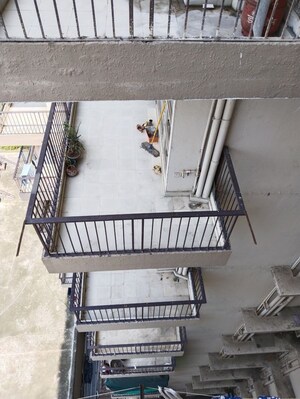 Staircase in 2 BHK Apartment at OP Floridaa, Sector 82 – for Sale