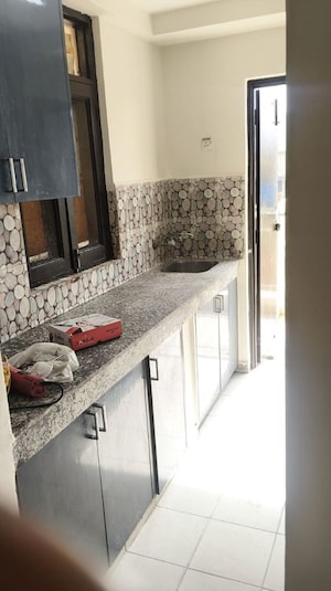Kitchen in 2 BHK Apartment at Signature Global Orchard Avenue, Sector 93 – for Sale