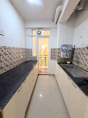 Kitchen in 2 BHK Apartment at Trident Embassy, Sector 1 Greater Noida – for Rent