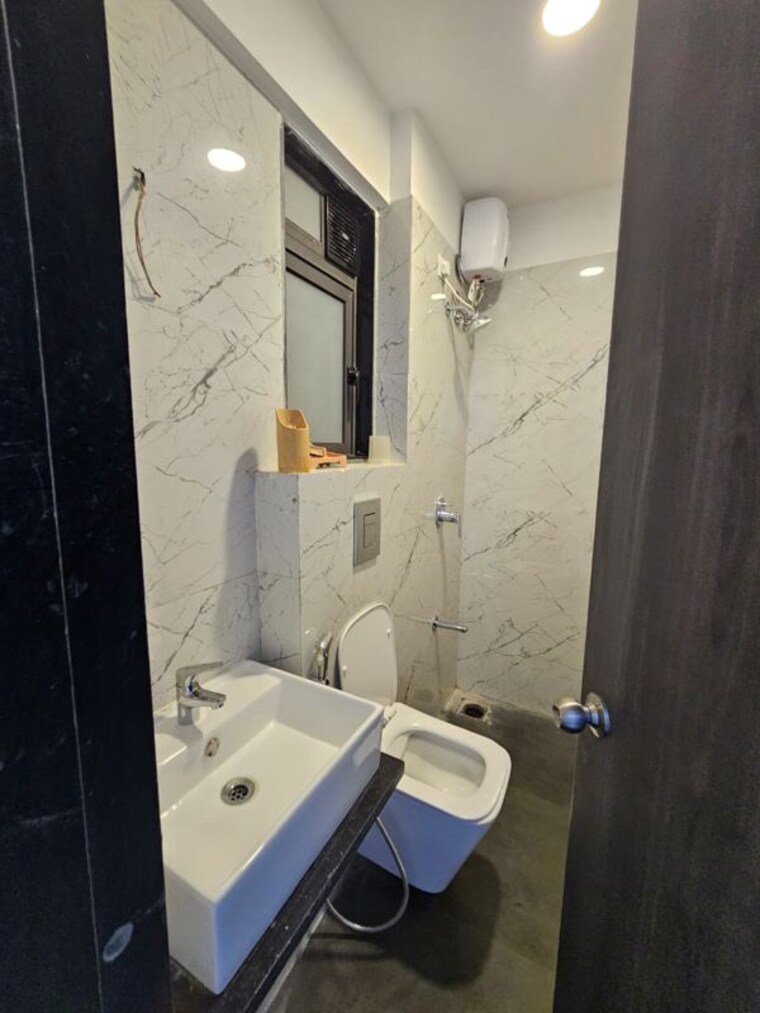 Bathroom, gangotri-apartments-tilak-nagar 2 Bedroom 660 Sq.Ft. Apartment In Tilak Nagar Mumbai 10492411