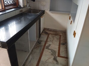 Kitchen in 1.5 BHK Apartment at Mewala Maharajpur – for Rent