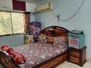 Bedroom in 1 BHK Apartment at Kshitij CHS, Yerawada – for Rent
