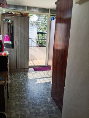Living Room in 1 BHK Apartment at Kshitij CHS, Yerawada – for Rent