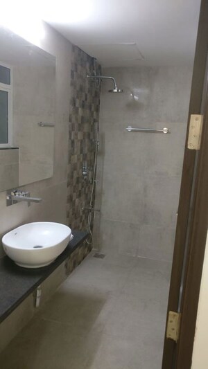 Bathroom in 2 BHK Apartment at Omkar Meridia, Kurla West – for Rent