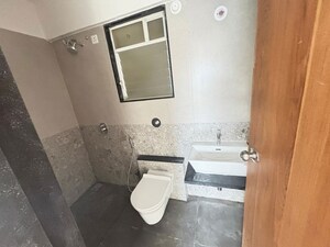 Bathroom in 2 BHK Apartment at Welworth Purnam, Hinjewadi – for Rent