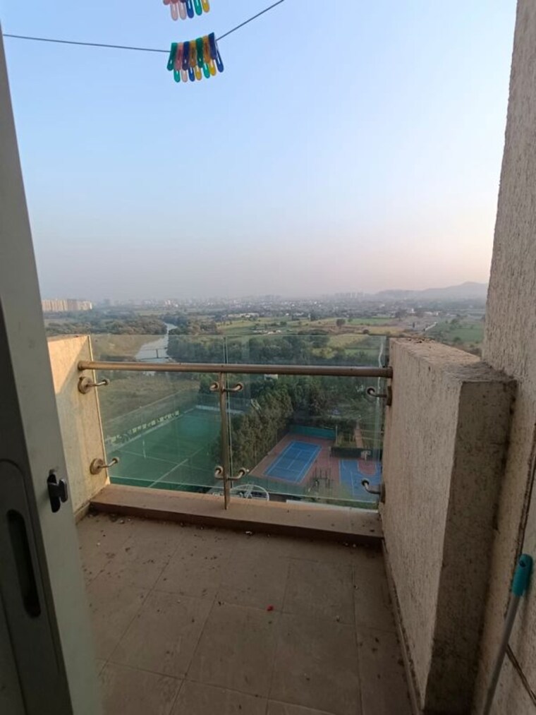 Balcony, lodha-belmondo 1 Bedroom 900 Sq.Ft. Apartment In Gahunje Pune 10492876