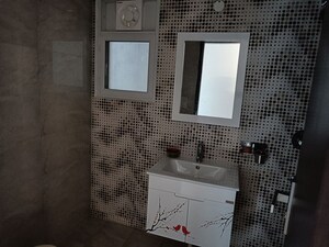 Bathroom in 3.5 BHK Apartment at Elite Golf Green, Sector 79 – for Rent