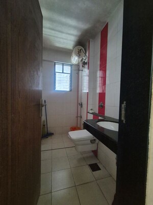 Bathroom in 2 BHK Apartment at Kamgar Putala Vasahat – for Sale