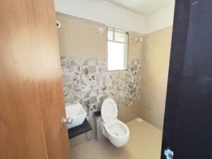 Bathroom in 2 BHK Apartment at Welworth Purnam, Hinjewadi – for Rent