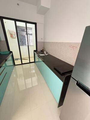Kitchen in 3 BHK Apartment at Lodha Lakeshore Greens, Dombivli East – for Rent