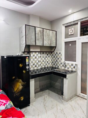 Kitchen in 1 RK Apartment at Gurgaon Village – for Rent