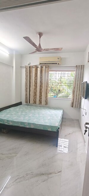 Bedroom in 2 BHK Apartment at Nazarene CHS, Malad West – for Rent