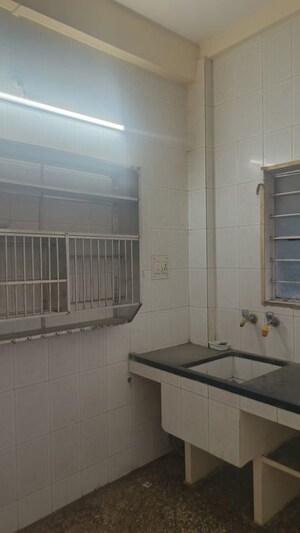 Kitchen in 1 BHK Apartment at Mira Society, Swargate – for Rent