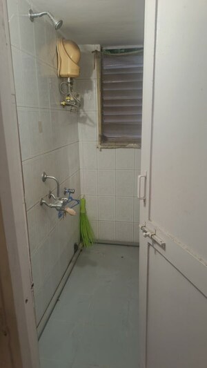 Bathroom in 1 BHK Apartment at Mira Society, Swargate – for Rent
