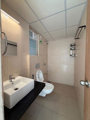 Bathroom in 3 BHK Apartment at Godrej Emerald, Ghodbunder Road – for Rent