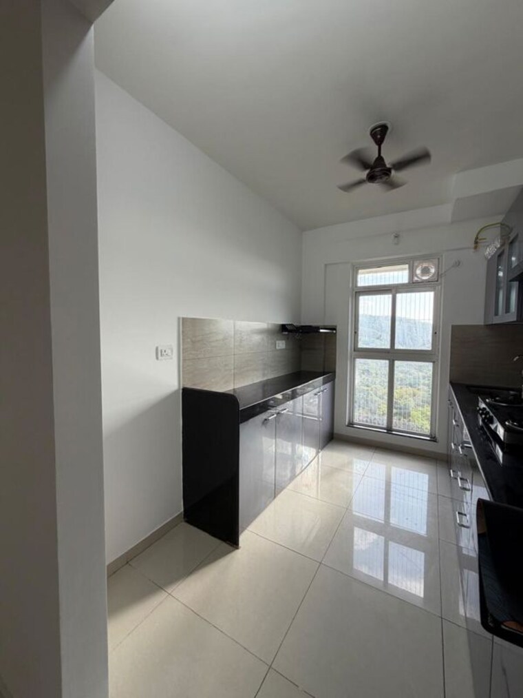 Kitchen, godrej-emerald 3 Bedroom 927 Sq.Ft. Apartment In Ghodbunder Road Thane 10493186