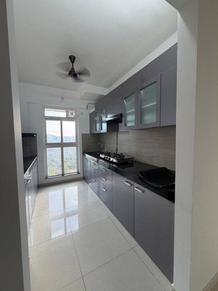 Kitchen, godrej-emerald 3 Bedroom 927 Sq.Ft. Apartment In Ghodbunder Road Thane 10493186