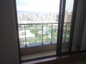 Room in 2.5 BHK Apartment at Rustomjee Elanza, Malad West – for Rent
