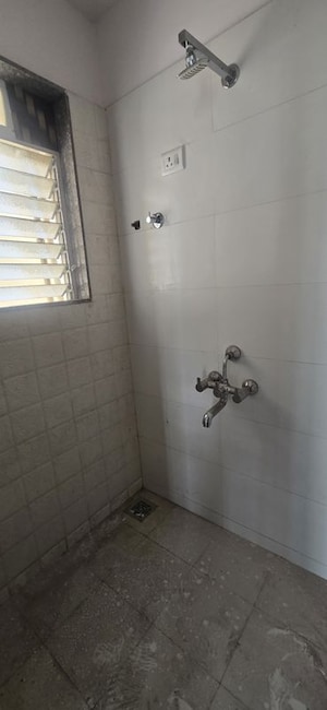 Bathroom in 1 BHK Apartment at Tilak Nagar – for Sale