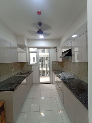 Kitchen in 2 BHK Apartment at Godrej Woods, Sector 43 – for Rent