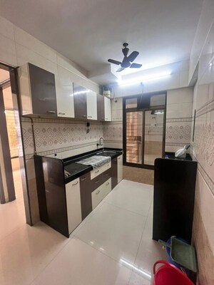 Kitchen in 1.5 BHK Apartment at Tilak Nagar – for Rent