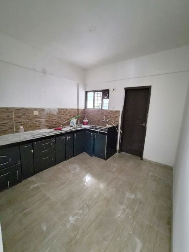 Kitchen, nirmiti-ragdari-apartments 3 Bedroom 1200 Sq.Ft. Apartment In Aundh Pune 10493338