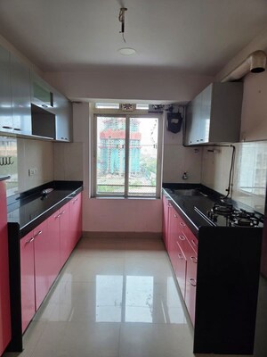 Kitchen in 2 BHK Apartment at Rustomjee Athena, Majiwada – for Rent